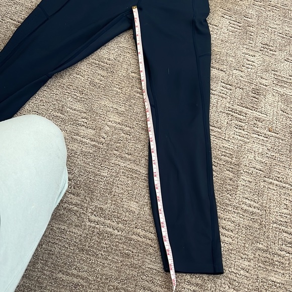 Athleta navy small laser cut zipper pocket leggings 25” - Picture 4 of 4